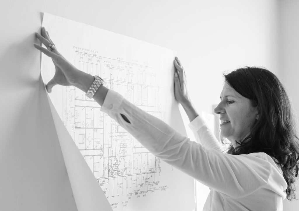 architect looking at sketch of building
